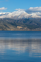 Amazing panoramic Landscape of Lake Pamvotida, Pindus mountain and city of Ioannina, Epirus, Greece