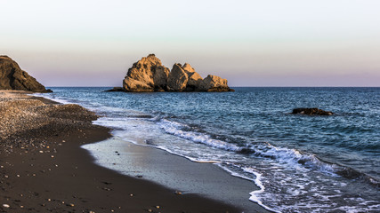Surf in the last rays of the setting sun