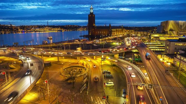 Time lapse of intense traffic in central Stockholm. In the backdrop the famous City Hall
