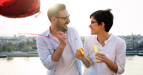 Young couple in love dating and smiling outdoor