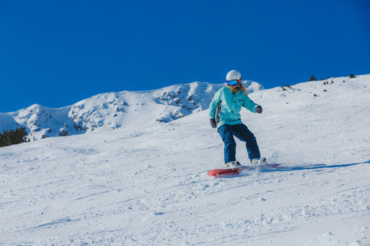 Snowboarder in the mountains 