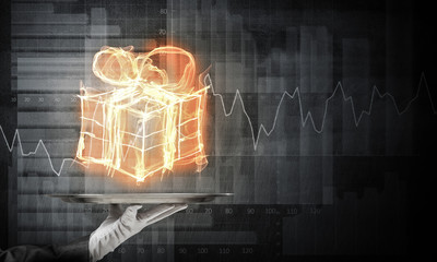 Hand of waitress presenting celebration concept.