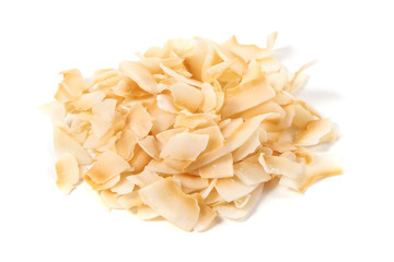 Slices of coconut, close-up, isolated on white background.
