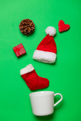 Obraz na płótnie Canvas White cup and Christmas gifts and heart shape