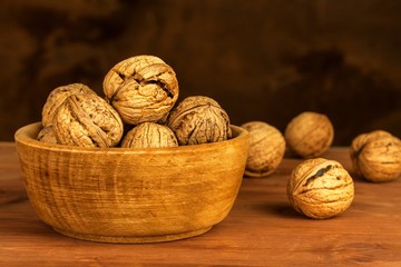 Walnuts on a wooden table. Healthy food. Sale of nuts. Advertising for walnuts.
