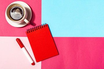 Blank notepad and coffee cup