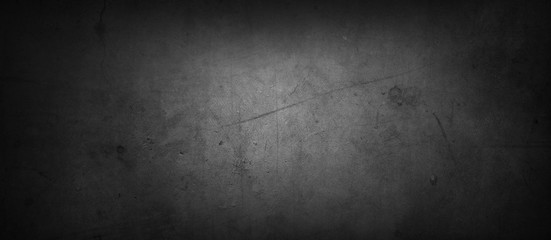 Dark grungy black wide concrete wall background