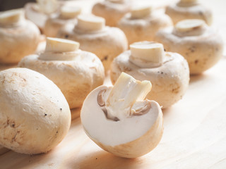 Mouth-watering mushrooms. Mushrooms cut in half.
