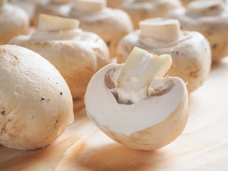 Mouth-watering mushrooms. Mushrooms cut in half.
