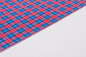 Fabric in cage with red blue, texture, background, pattern.