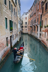 Fototapeta na wymiar Venetian gondolier, Venice Italy