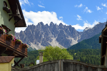 Fototapeta na wymiar View of the Tyrol mountains in Austria from a village