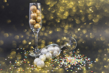 Golden happy new year concept with champagne glasses