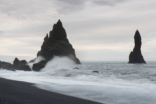 Fototapeta view of the shore with black sand in Iceland
