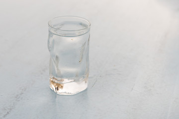 Glass of frozen water