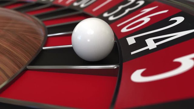 Casino roulette wheel ball hits 24 twenty-four black