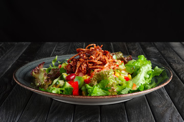 Salad with fresh vegetables and beef