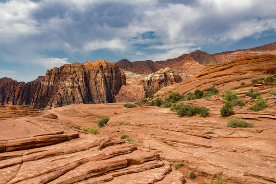 Magnificent view of the petrified sand dunes and Navajo red and white sandstone mountains of Snow Canyon State Park in Utah.