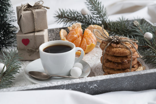 Christmas Breakfast In Bed On A Tray With Snow, Gifts, Fir-tree And Tangerines.