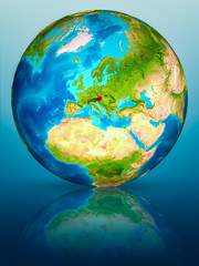 Austria on Earth on reflective surface