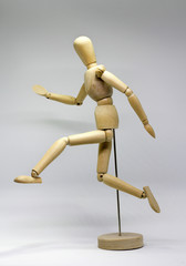 wooden dummy doll run jump