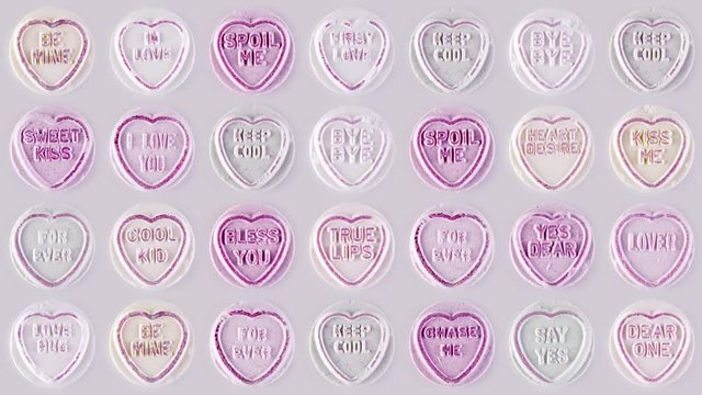 a changing sequence of many love hearts sweets and candy