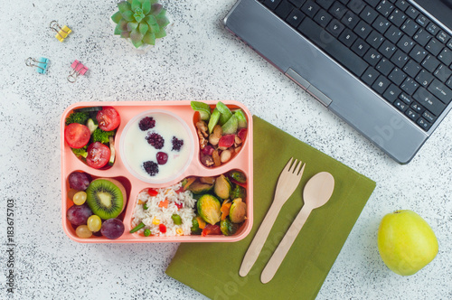 Open Lunch Box With Healthy On Office Table Open Lunch Box With Healthy On Office Table