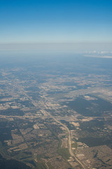 Metropolis Area of Houston, Texas Suburbs from Above in an Airplane