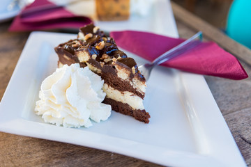 Delicious chocolate cake with wipped cream.