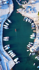 Aerial drone bird's eye view of small marina with boats docked in Voula, Athens riviera, Attica,...