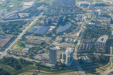 Metropolis Area of Houston, Texas Suburbs from Above in an Airplane