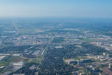 Metropolis Area of Houston, Texas Suburbs from Above in an Airplane