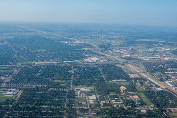 Metropolis Area of Houston, Texas Suburbs from Above in an Airplane