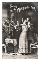 Young couple celebrated with christmas tree Vintage picture