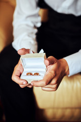 Bride and groom with wedding rings
