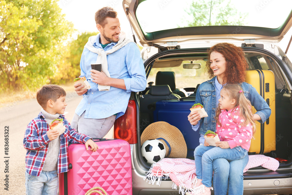 Canvas Prints young family with children near car, outdoors