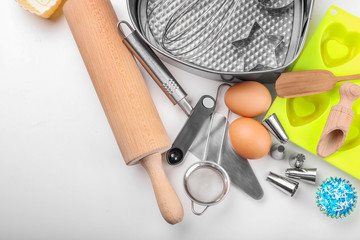 Set of kitchenware for cooking pastries on white background
