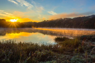 Fototapeta na wymiar Morning foggy landscape image of Nemunas river