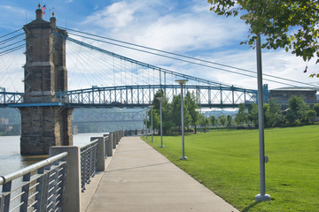 Smale Riverfront Park in Cincinnati, Ohio next to the John A Roebling Suspension Bridge
