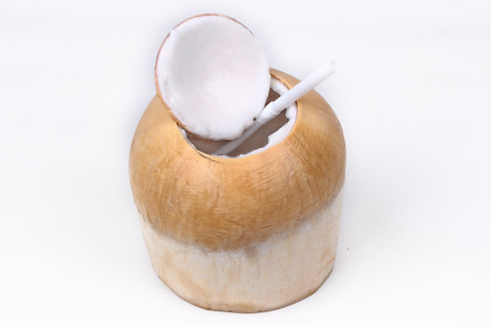 Ready served of aromatic coconut with tube for drinking  flagrant juice .