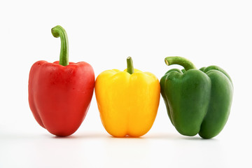 Bell pepper is a group of many colors on a white background.