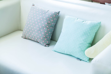 pastel pillow on sofa