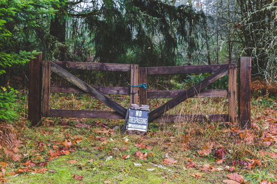 No Trespassing Sign on Wood Gate