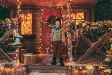 boy near fairy-tale house