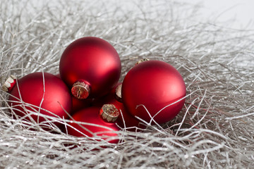 Red Christmas Ornaments in a Silver Glitter Wreath