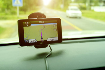 GPS-enabled navigation in road applications, Close-up of gps navigation system In car