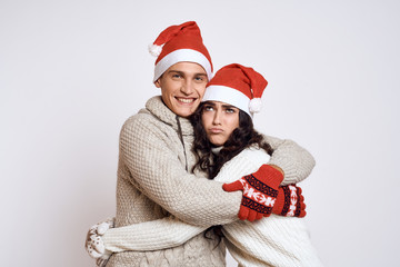 a couple is embracing, a man is smiling, a woman is unhappy, emotions, a new year