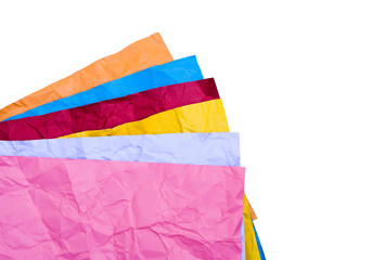 crumpled colour paper on white background with copy space