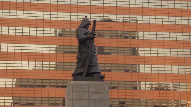 SEOUL, SOUTH KOREA &ndash; JULY 216 : Video shot of Gwanghwamun Square at sunset with Yi Sun-Sin Statue  and people in view