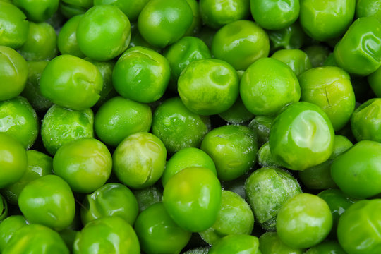 Frozen pea peases texture background. Green pease background pattern. Vegetable.